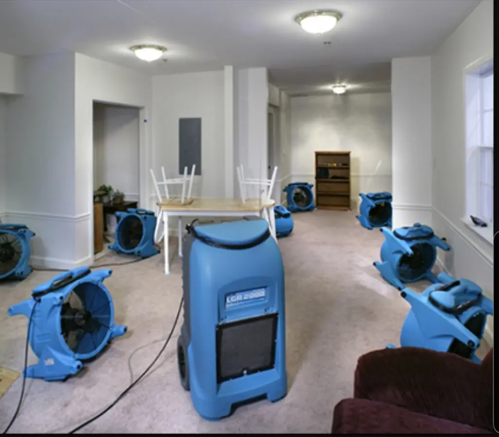 Air movers and dehumidifier setup for Water Extraction & Removal in Clive